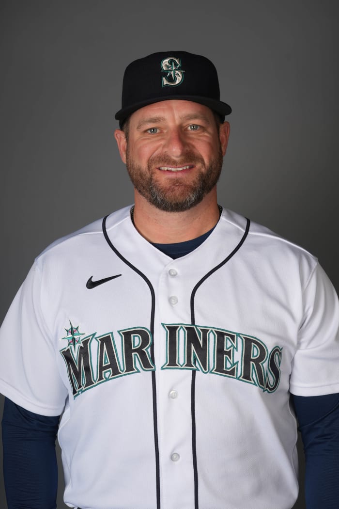 Feb 23, 2023; Peoria, AZ, USA; Seattle Mariners bullpen coach and quality control coach Stephen Vogt (13) poses during Photo Day at Peoria Sports Complex.